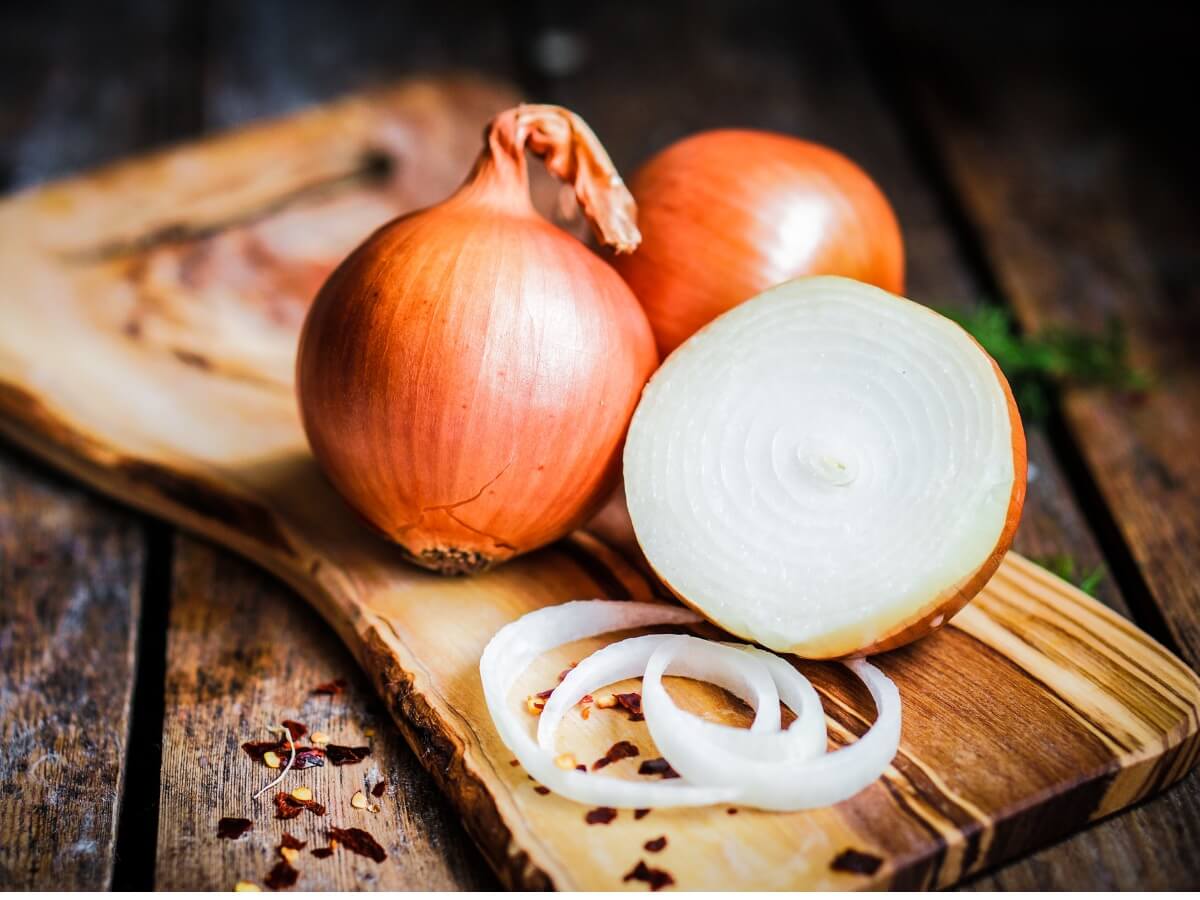 A cut onion on a table.