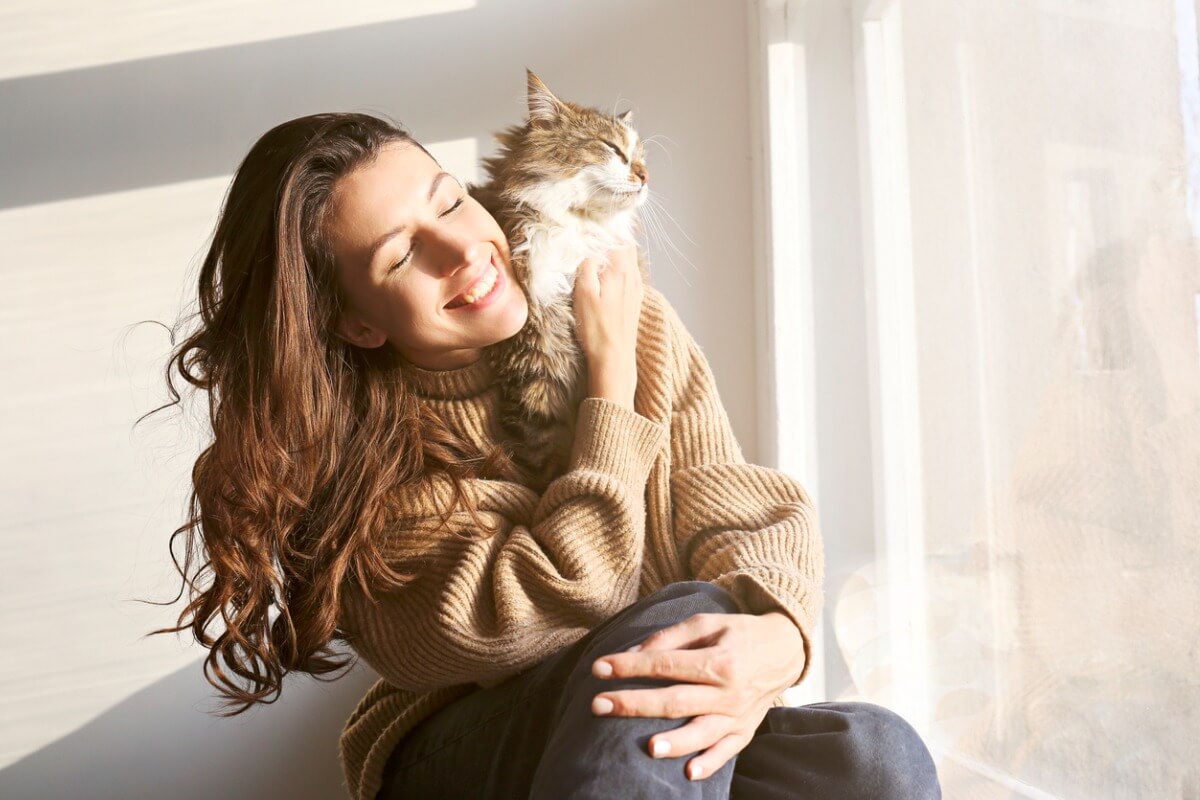 A woman and her cat.